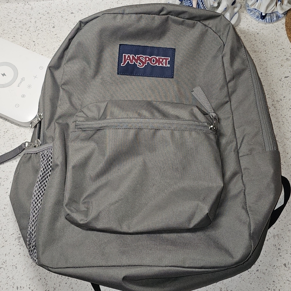 Jansport Superbreak Gray Backpack with Padded Straps and Durable Fabric
